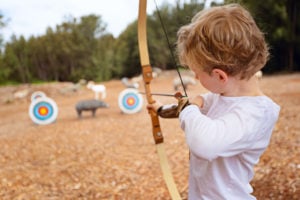 kid practicing archery