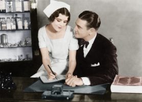 Nurse sitting on the doctor's lap. Sexism